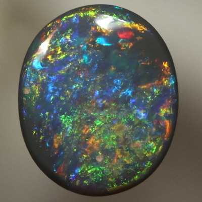 SOLID BLACK OPAL Bright fire. Pinfire pattern.